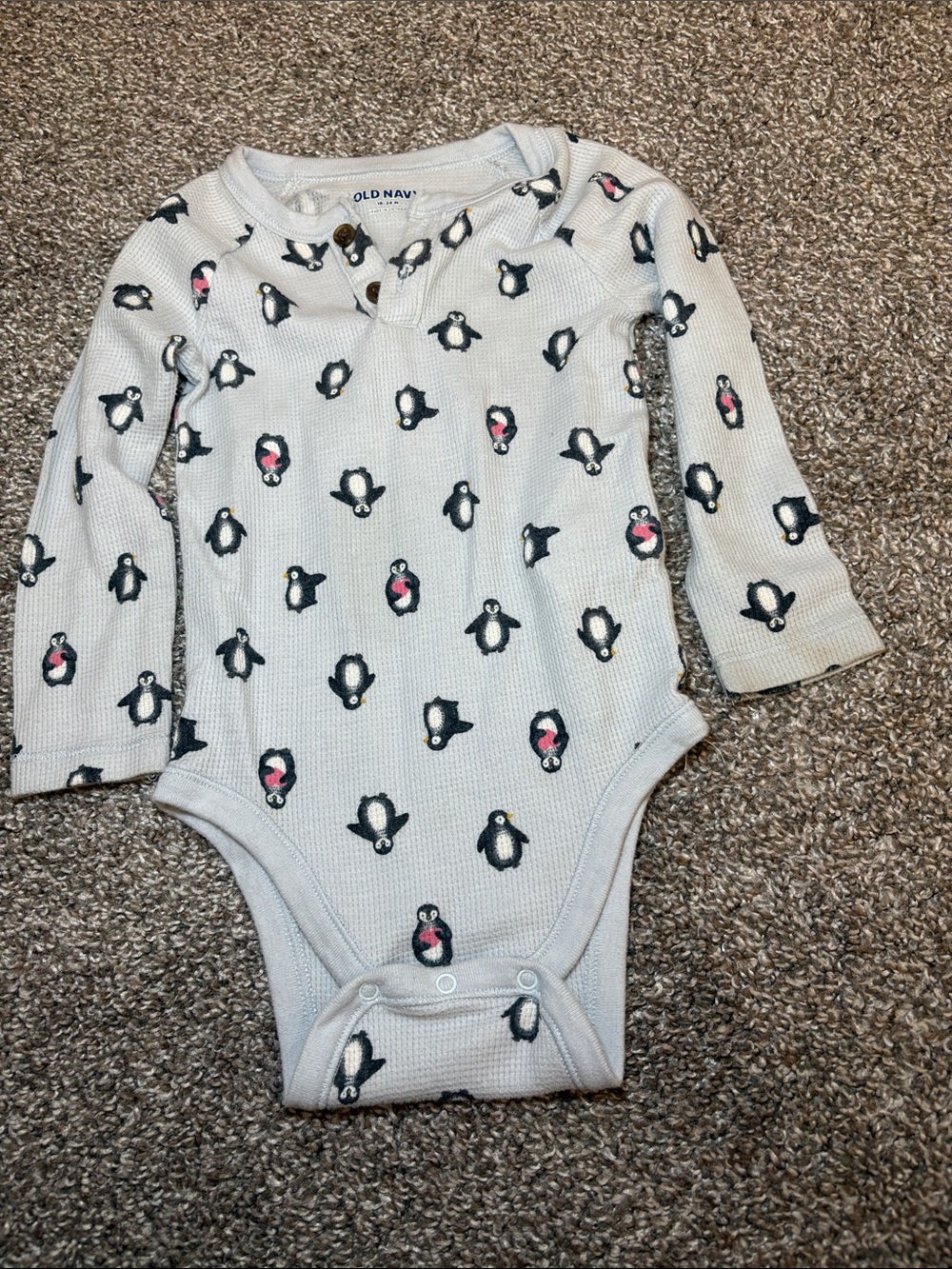 Old Navy Cream Penguin Thermal One-Piece Bodysuit with Black and Pink Accents